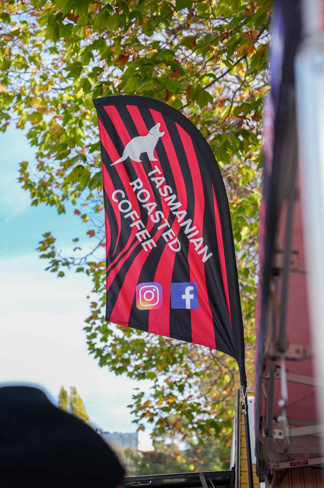 Banner for Cheeky Devil Coffee Roasters displaying the text Tasmanian Toasted Coffee with Instagram and Facebook icons